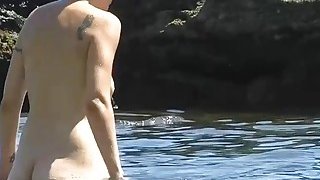 Saw this fit and firm Lady at the nudist beach Thumbnail