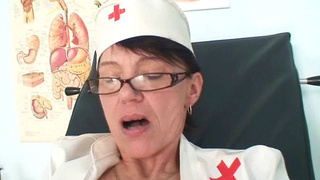 Aged amateur mom wears glasses and latex uniform Thumbnail