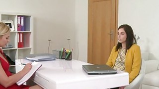 Blonde female agent eats brunette on the couch Thumbnail